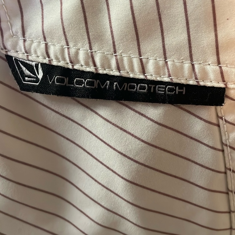 Volcom size 32 white with brown pinstripes swim shorts.